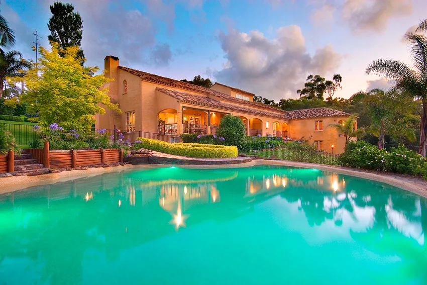 Naturalistic pond and pool within an estate garden
